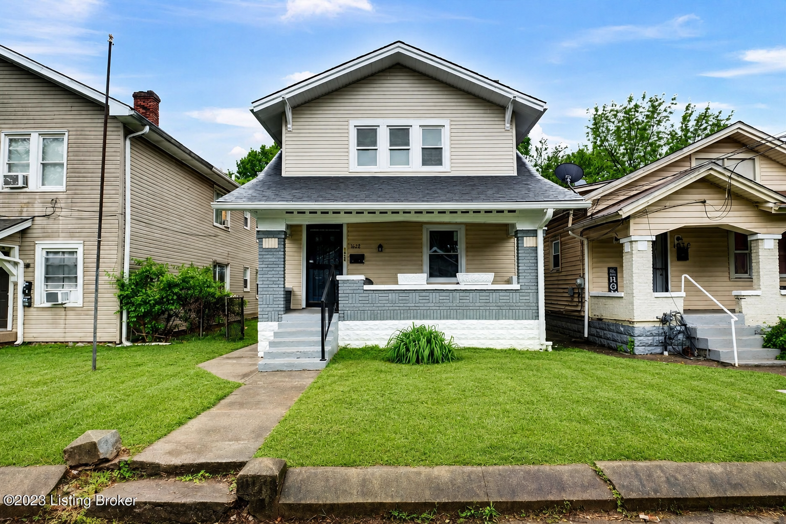 Renovated exterior after Rehab Coach scope